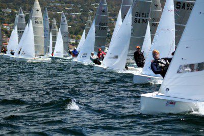 Start of race one of the 73rd Sharpie Nationals on the River Derwent. Photo Angus Calvert.
